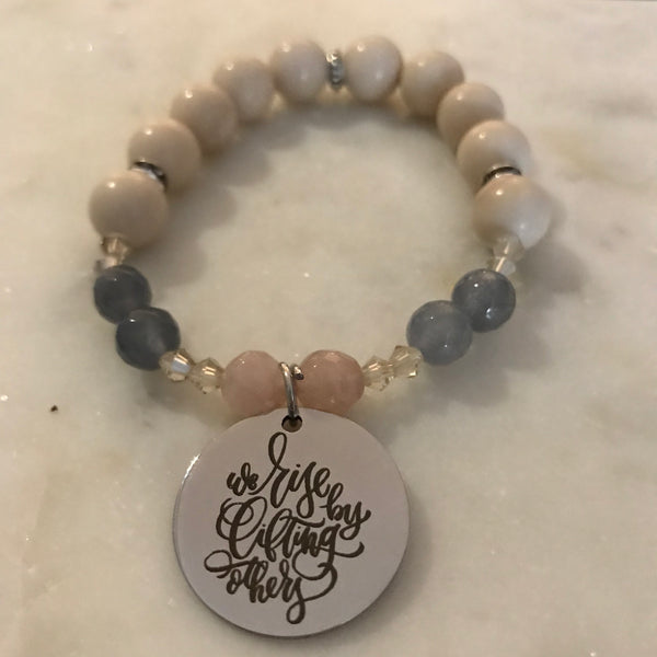 We Rise By Lifting Others